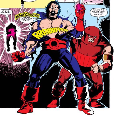 Classic panel — a man holds the glowing gem as Juggernaut looms