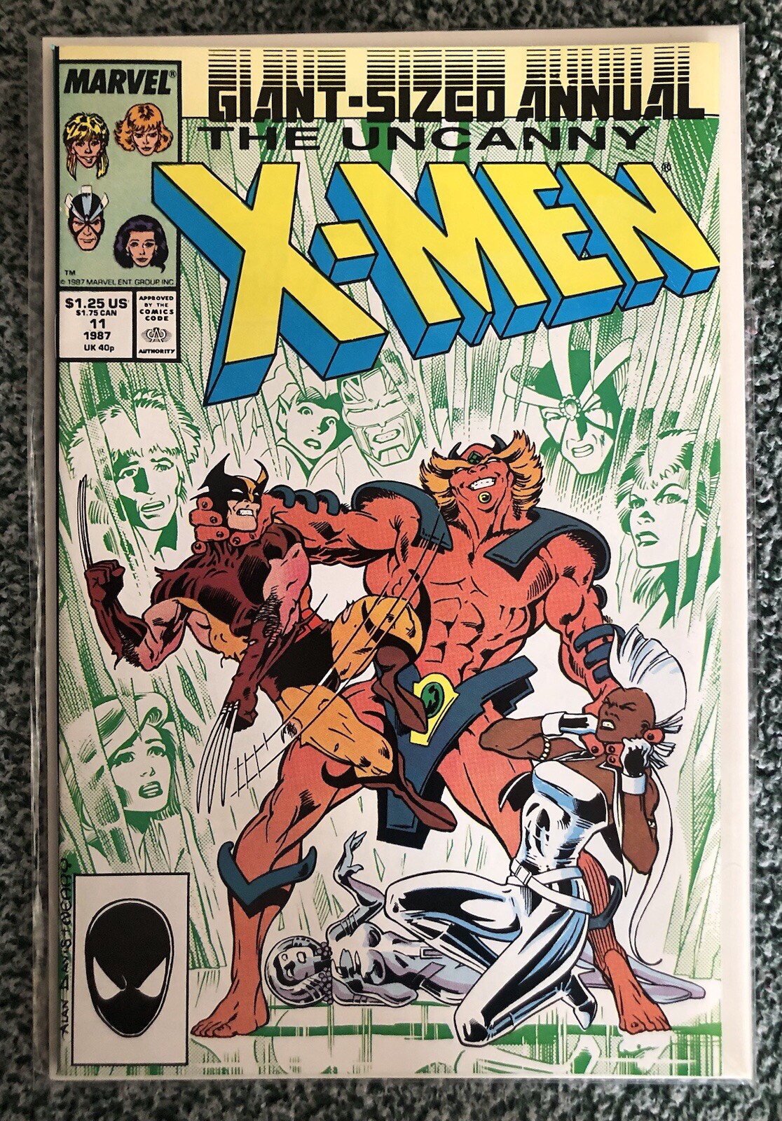 Uncanny X-Men Giant-Sized Annual #11 (1987) cover: Wolverine fighting Horde, with Storm and the metal Psylocke fallen